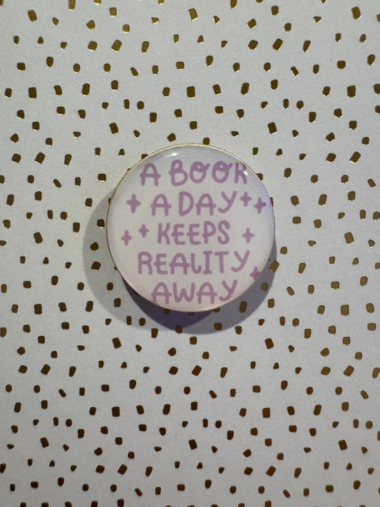 A Book A Day Keeps Reality Away Mini Magnet