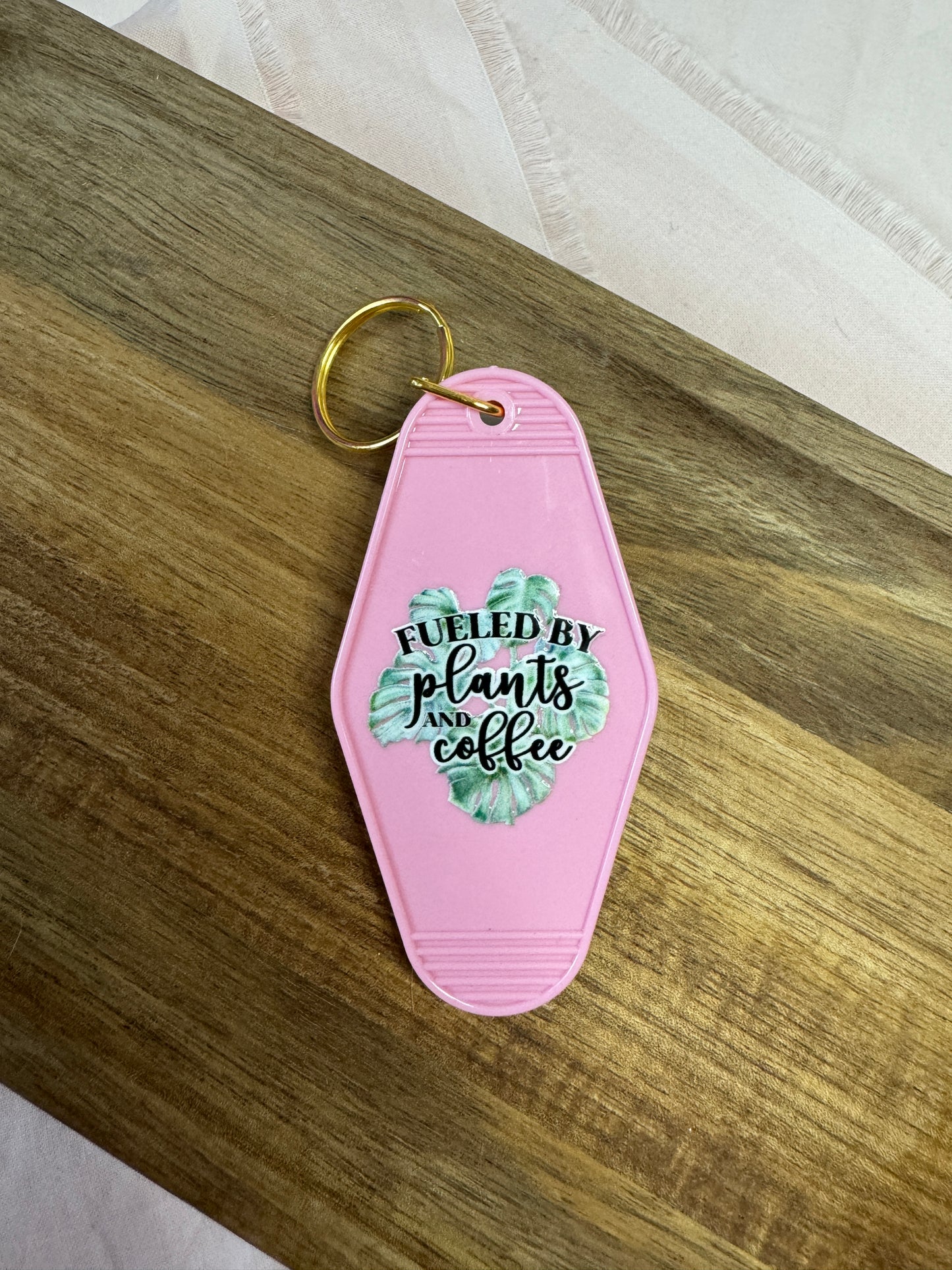 Fueled By Plants And Coffee Motel Keychain