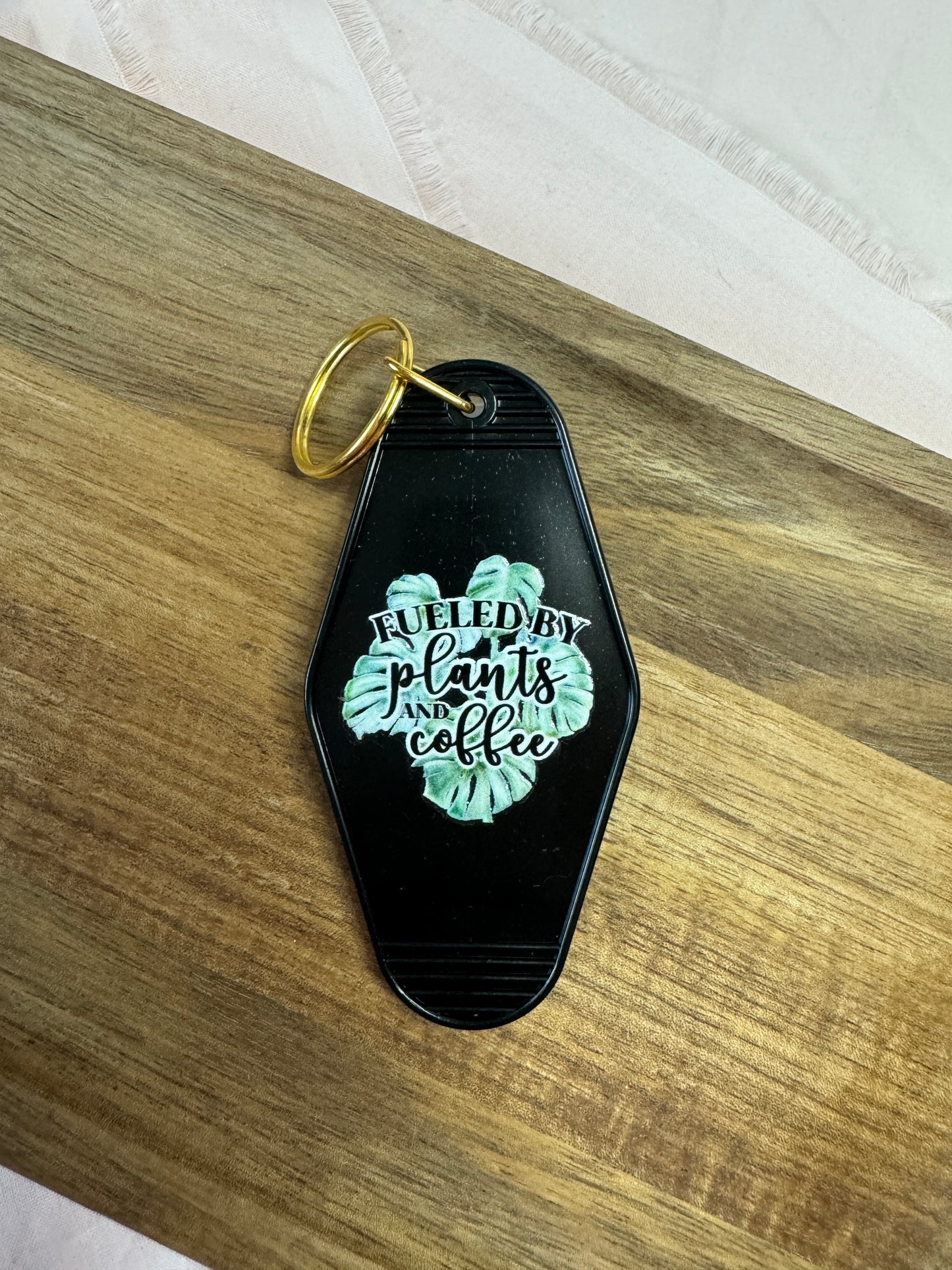 Fueled By Plants And Coffee Motel Keychain