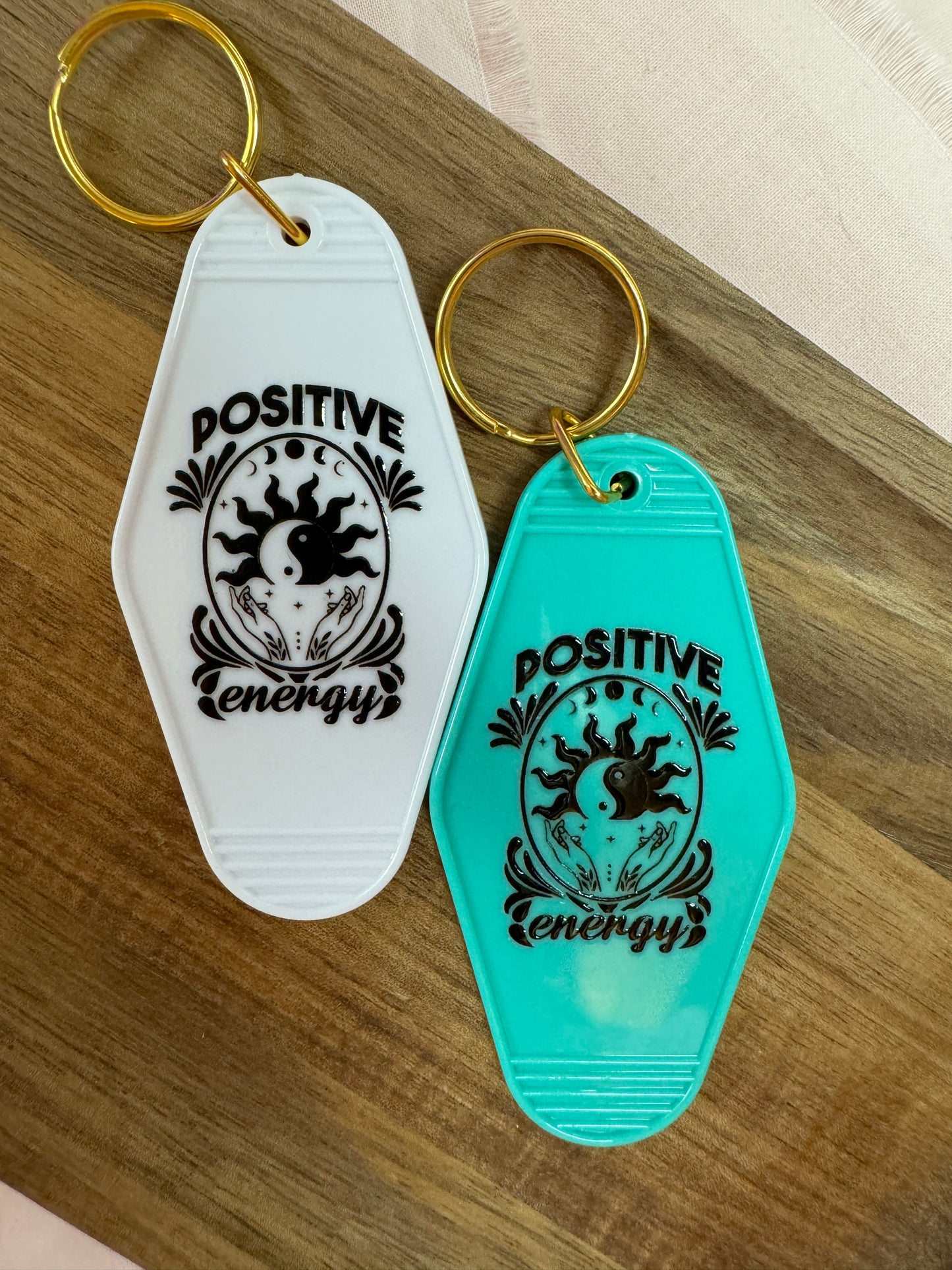 Positive Energy Motel Keychain