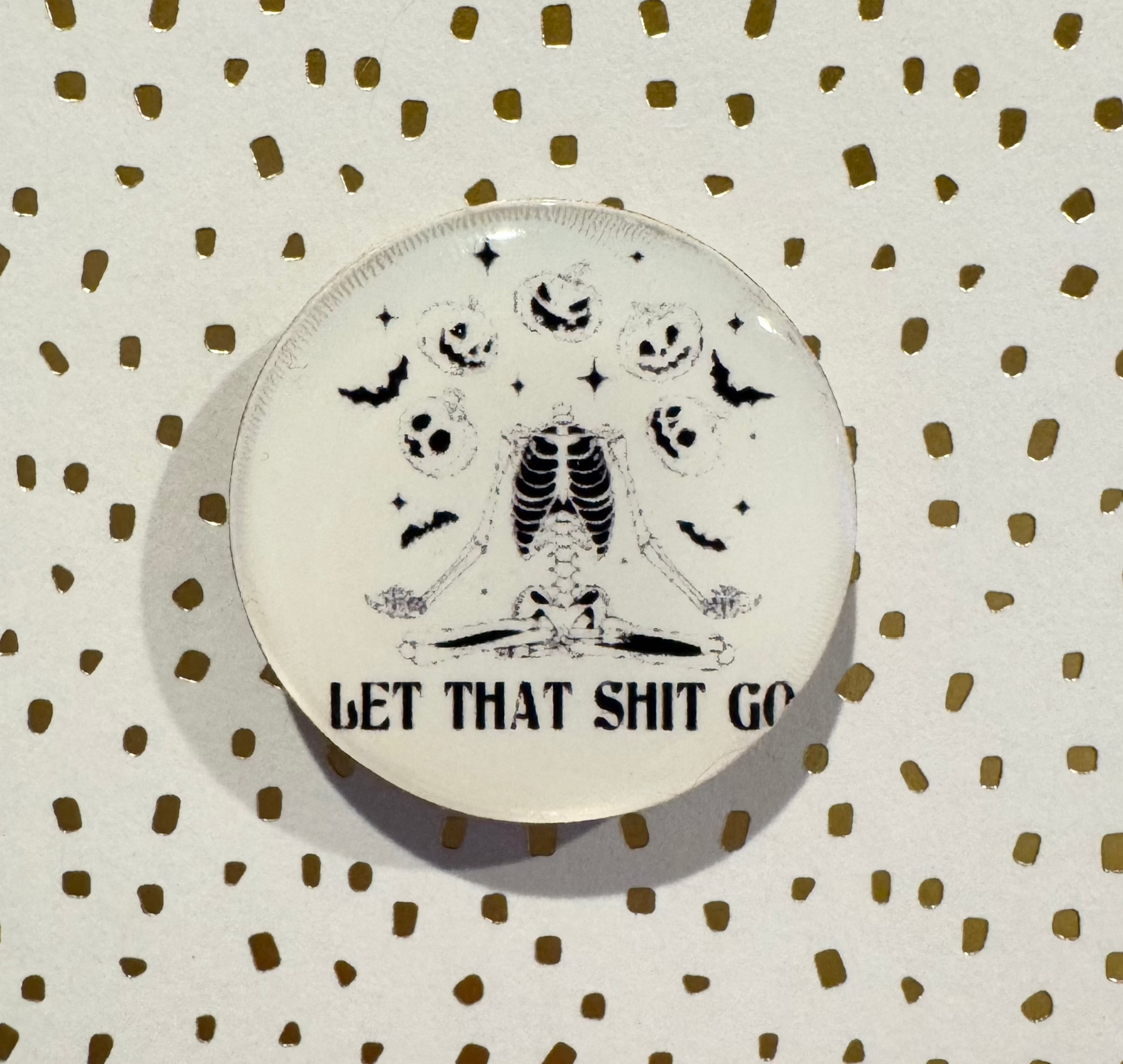 Let That Shit Go Mini Magnet with a headless skeleton with bats and pumpkins